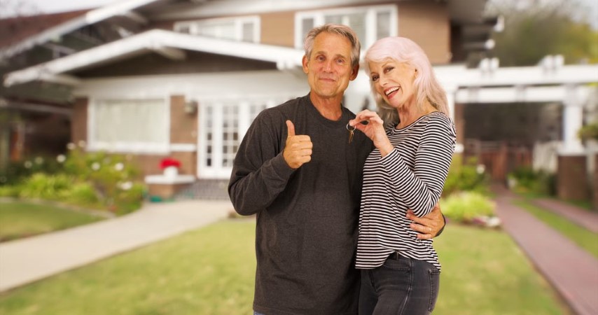 retired couple with new home